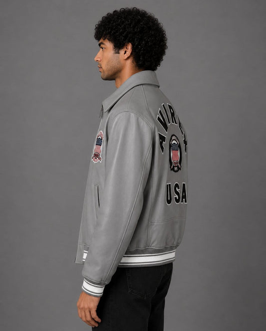 Side profile of grey sheepskin leather varsity bomber jacket
