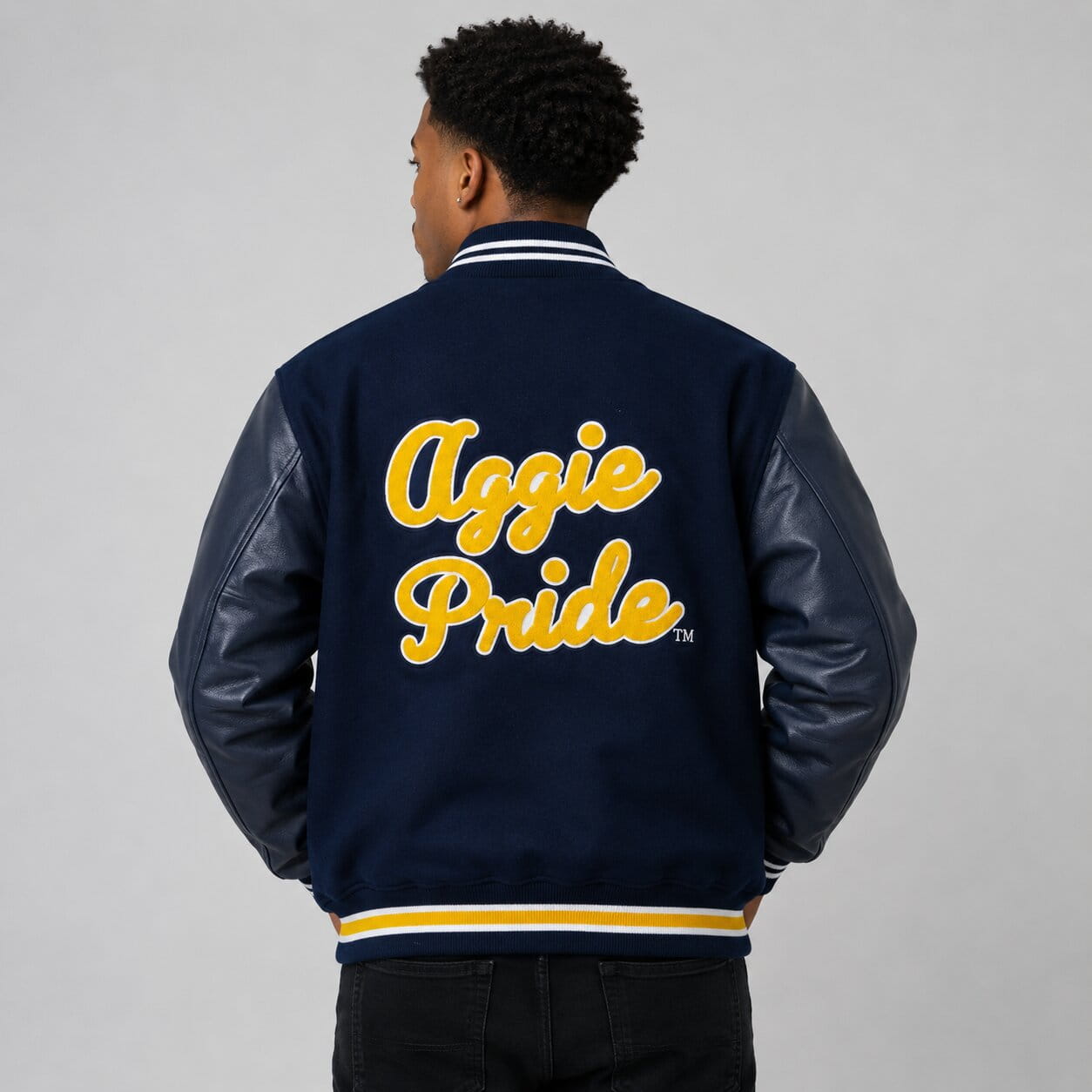 Back view showing large chenille Aggie Pride design.