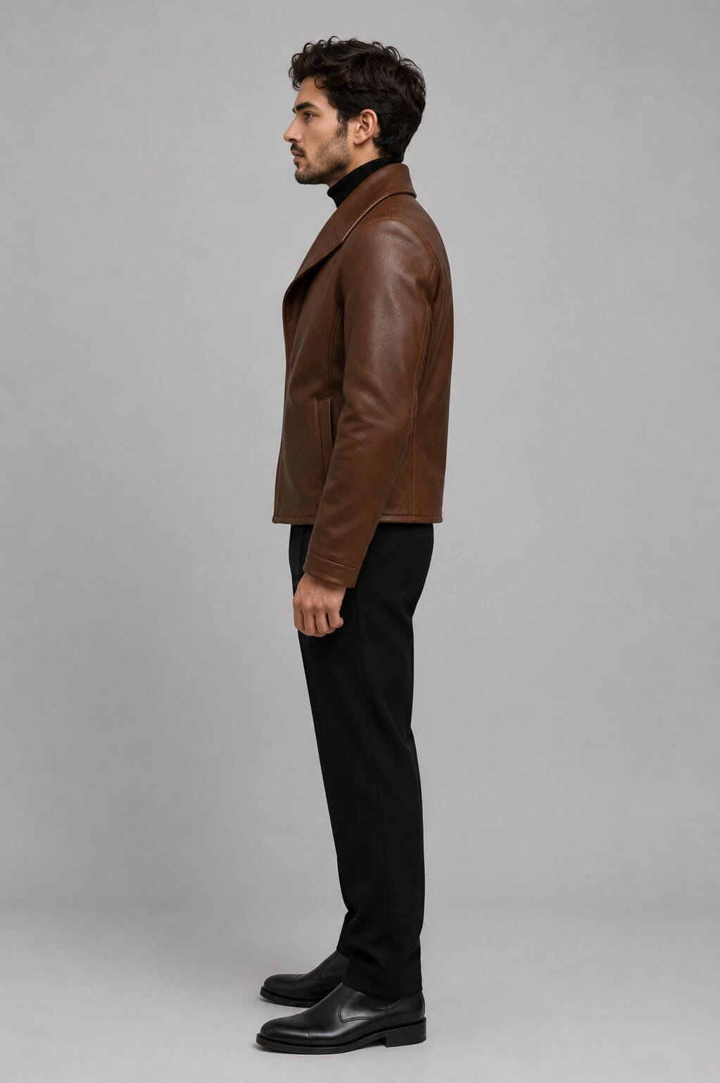 Side profile of brown designer leather winter coat by avanzar leather