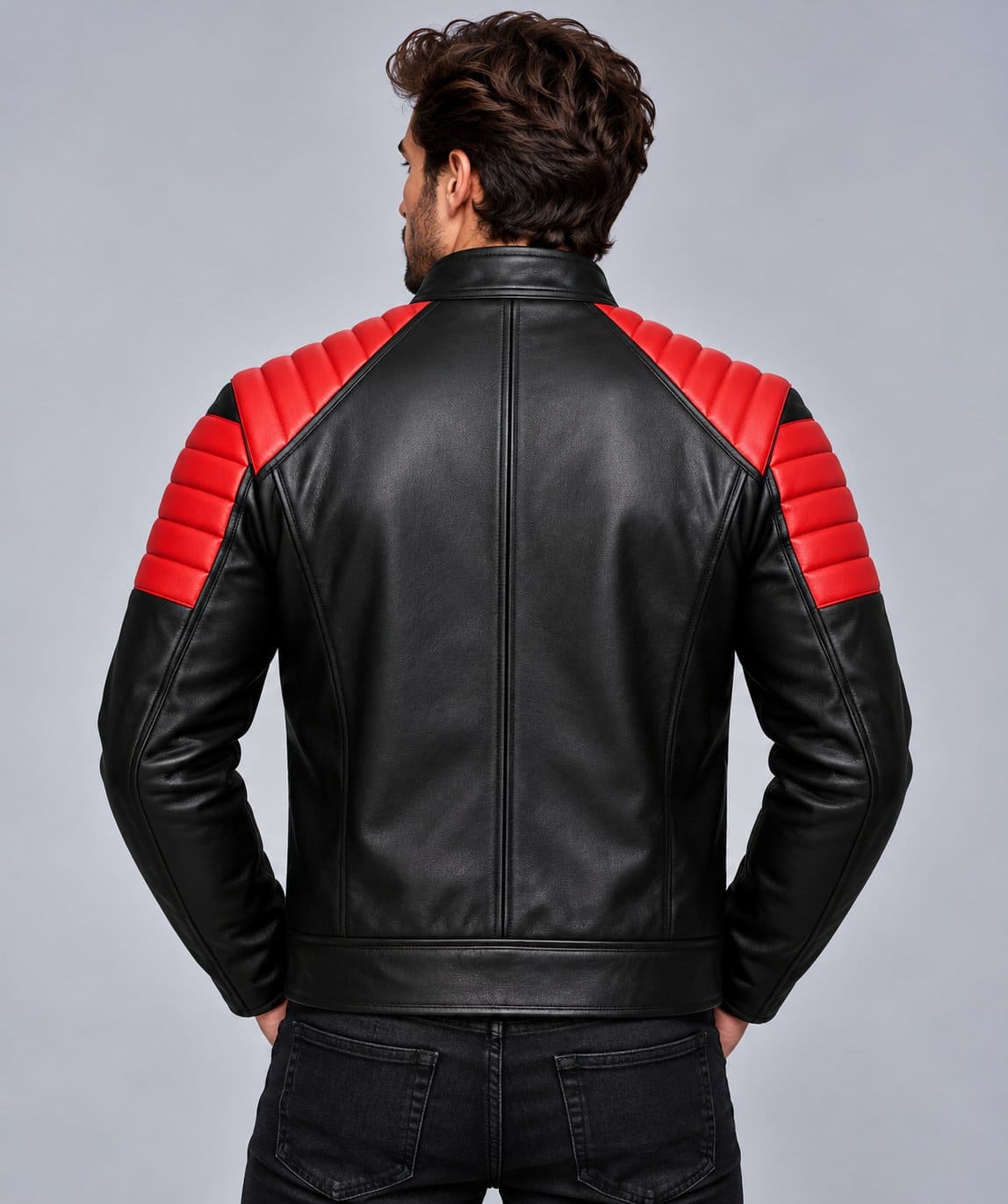 Men’s black and red genuine leather moto jacket back view with quilted shoulder detailing and bold contrasting leather panels