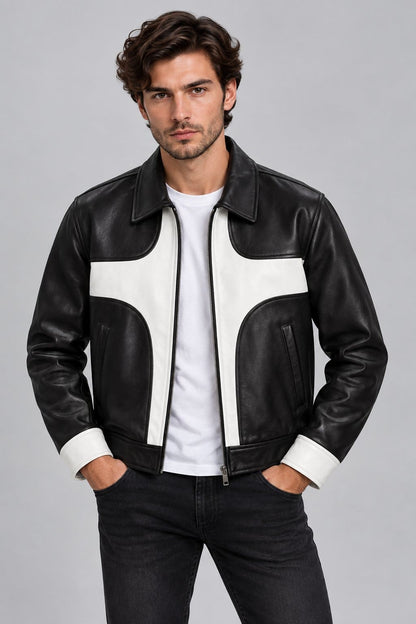 Men’s black and white lambskin leather color block biker jacket front view with bold contrast panels, zipper closure and modern motorcycle styling