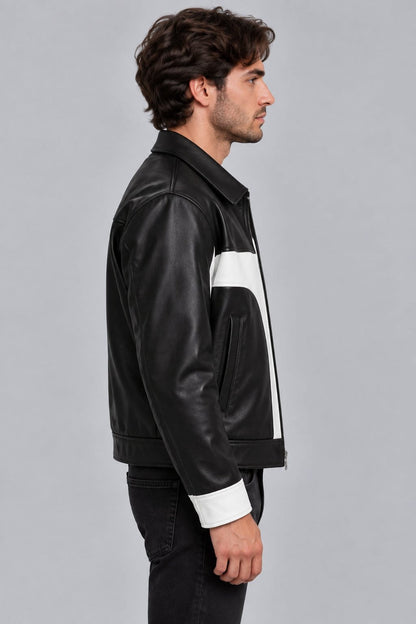 Men’s black and white lambskin leather color block biker jacket side view showing fitted silhouette, contrasting leather panels and long sleeves
