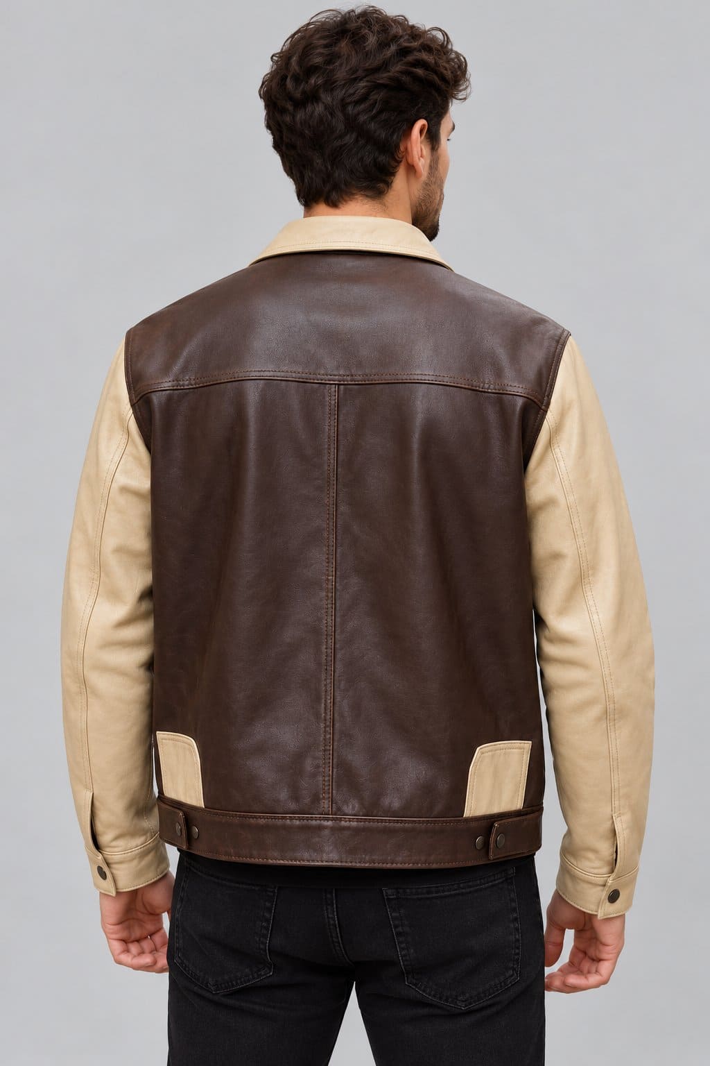 Men’s brown and beige lambskin leather trucker jacket back view with clean color block design and classic trucker silhouette