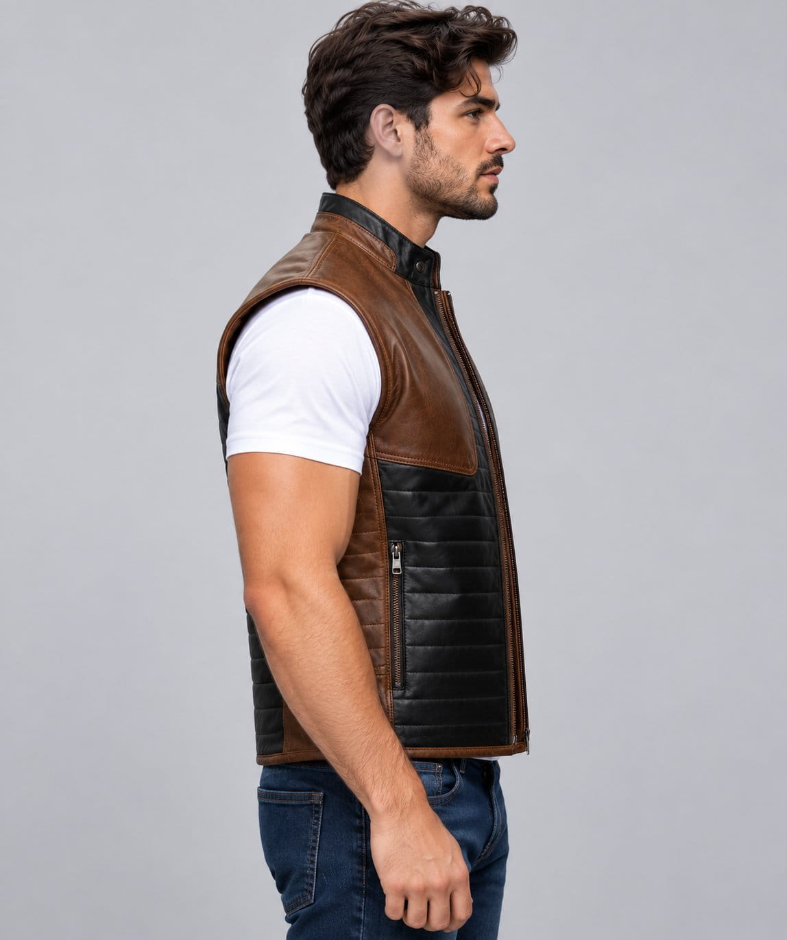 Men’s brown and black genuine leather two tone biker vest side view showing structured fit, contrasting leather panels and sleeveless biker design