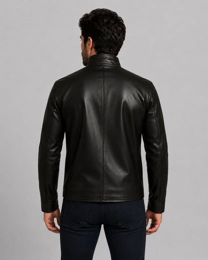 back view of the black real leather Punisher biker jacket featuring the white skull emblem on the chest and a closed zipper by avanzar leather.
