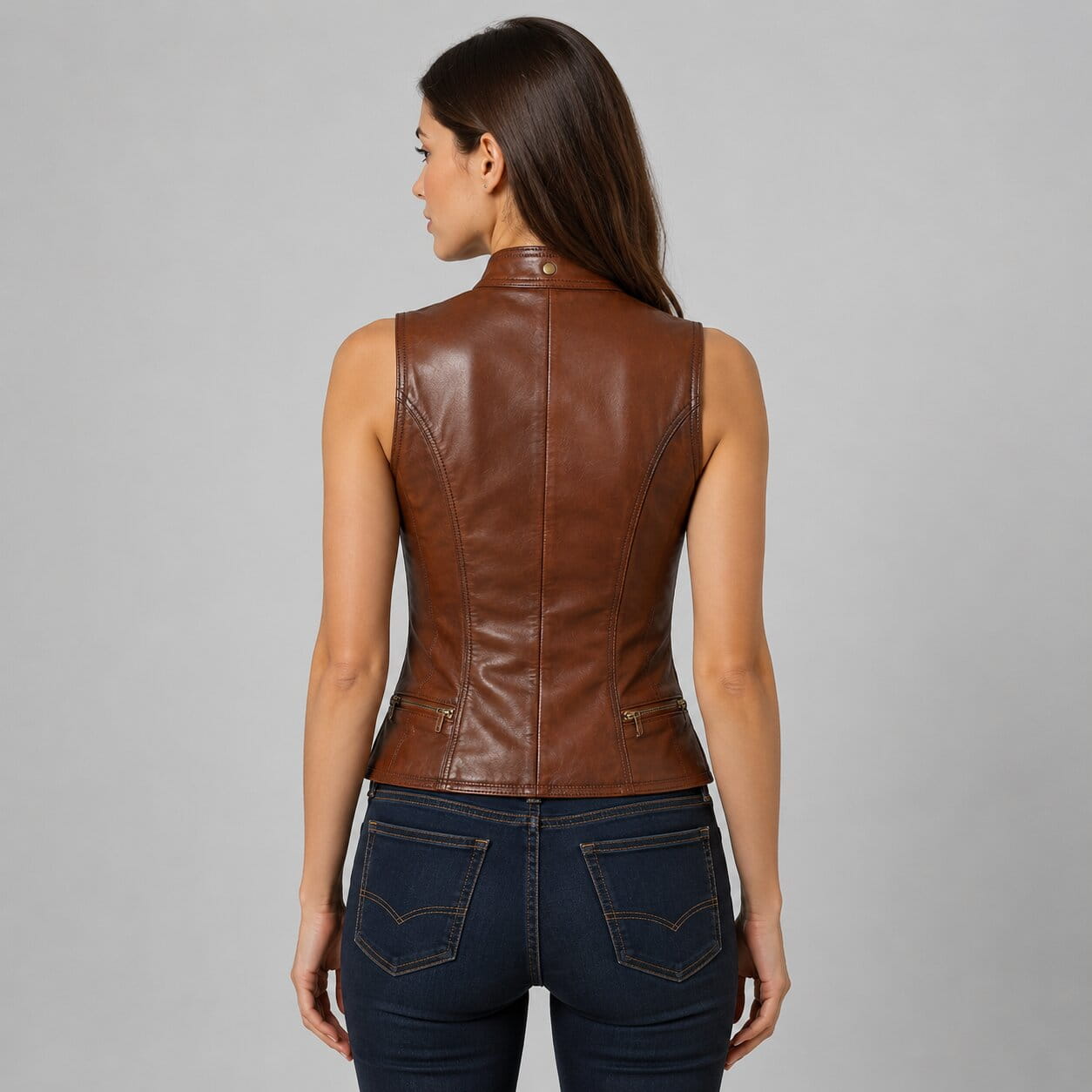 Ride In Confidence With A Women Brown Leather Biker Vest back view by avanzar leather