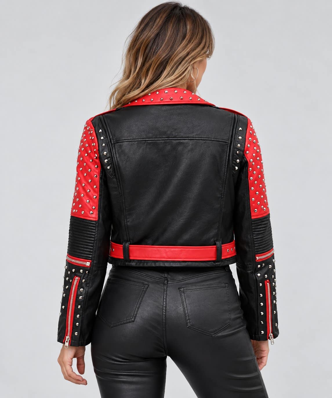 Women’s red and black studded genuine leather biker jacket back view with bold color block panels, studded detailing and clean leather finish