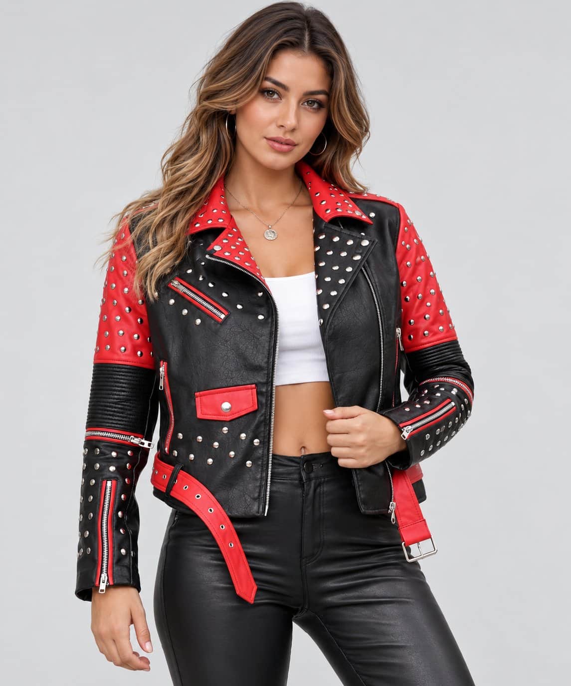 Women’s red and black studded genuine leather biker jacket front view with bold contrast panels, studded detailing, zipper closure and fitted motorcycle styling
