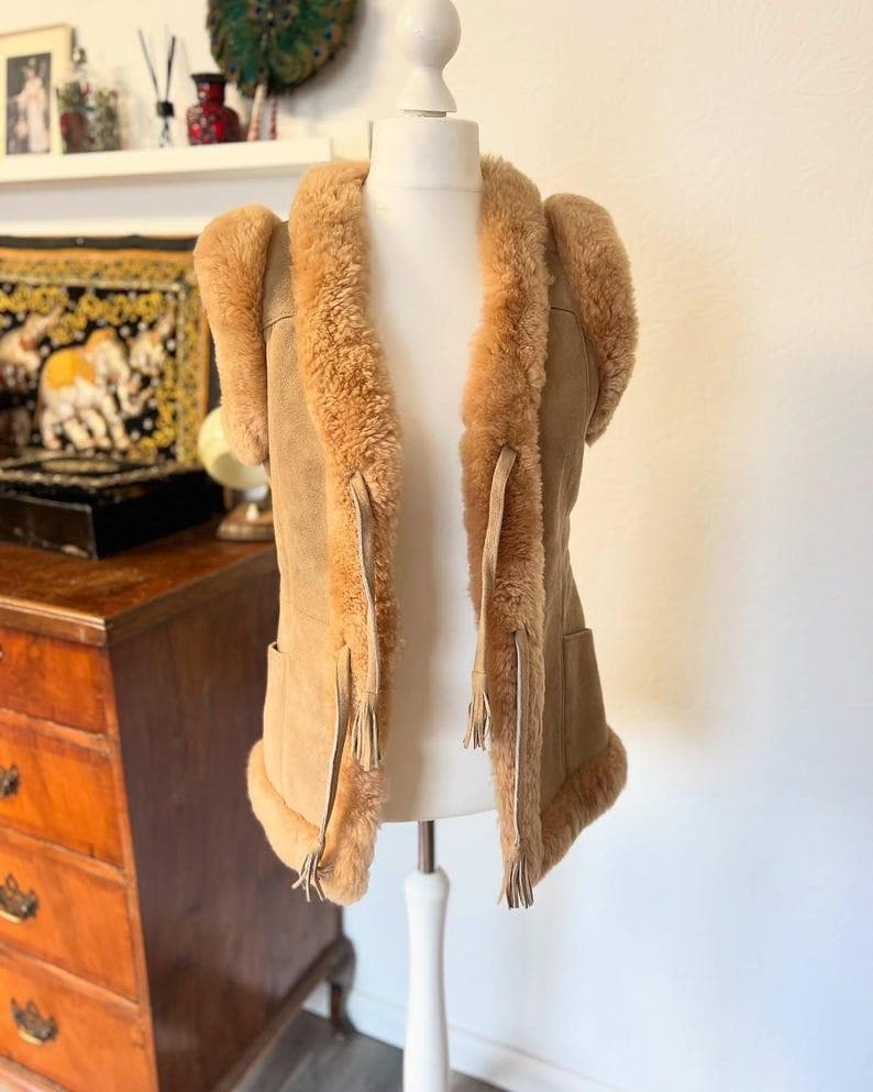 Women's brown suede shearling vest with fringe tie front