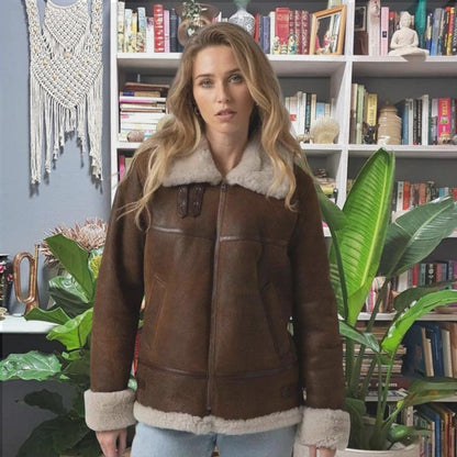 Women's brown leather aviator jacket with cream shearling collar and cuffs