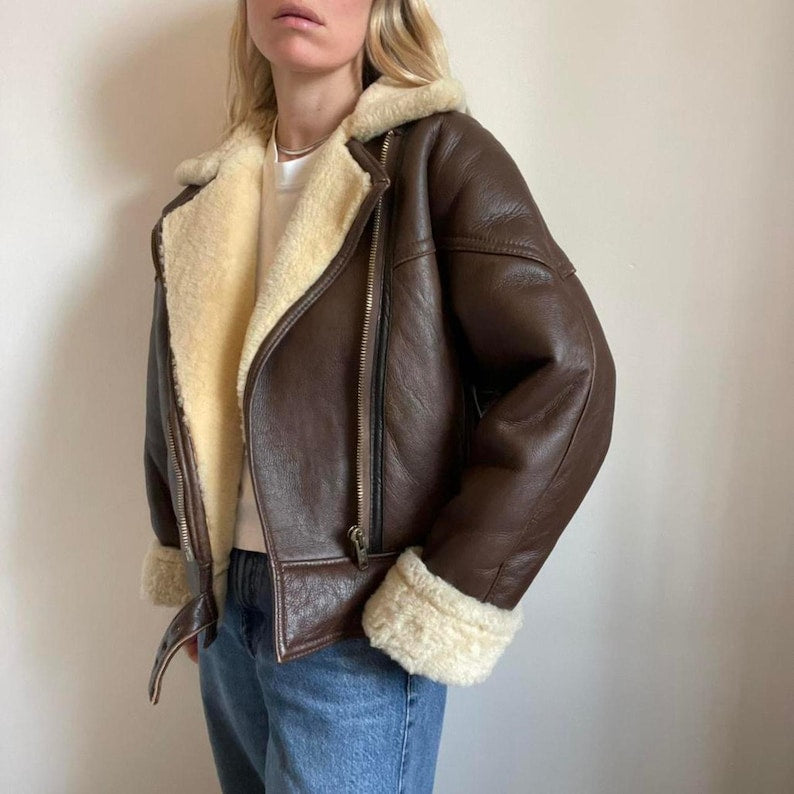 Asymmetric zip on brown 90s aviator jacket