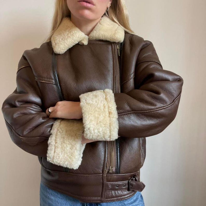 Cream shearling collar and cuffs on brown aviator jacket
