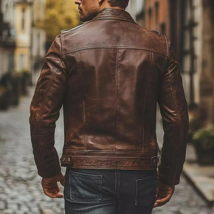 Collar, zip and pockets on distressed brown cowhide jacket