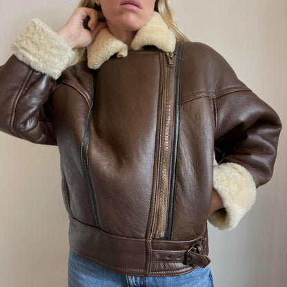 Shearling cuffs on women's oversized brown jacket