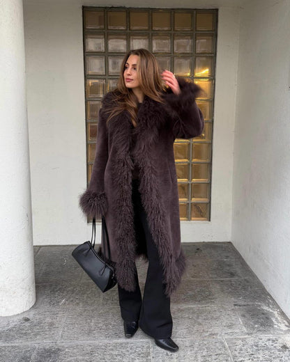 Women's long brown suede maxi coat with shaggy trim, front view