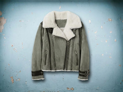 Flat lay of gray suede jacket with asymmetrical zip and lapels