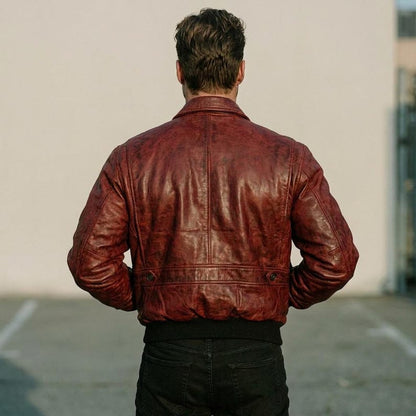 Red distressed sheepskin bomber jacket for men with rib-knit cuffs and hem